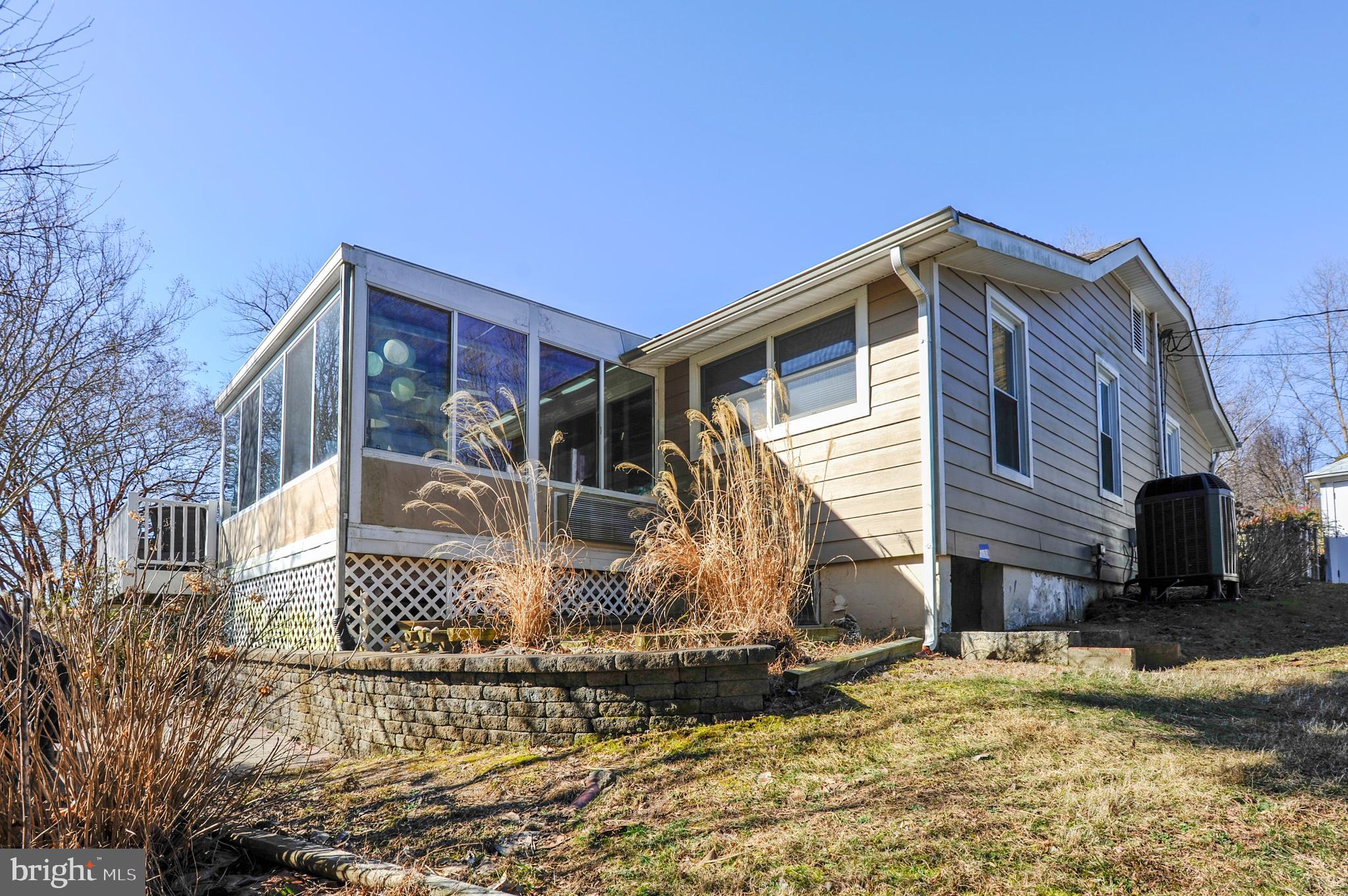 4888 Ridge Road Chesapeake Beach, MD 20732 - Photo 4 of 56 Sunroom with seasonal bay views