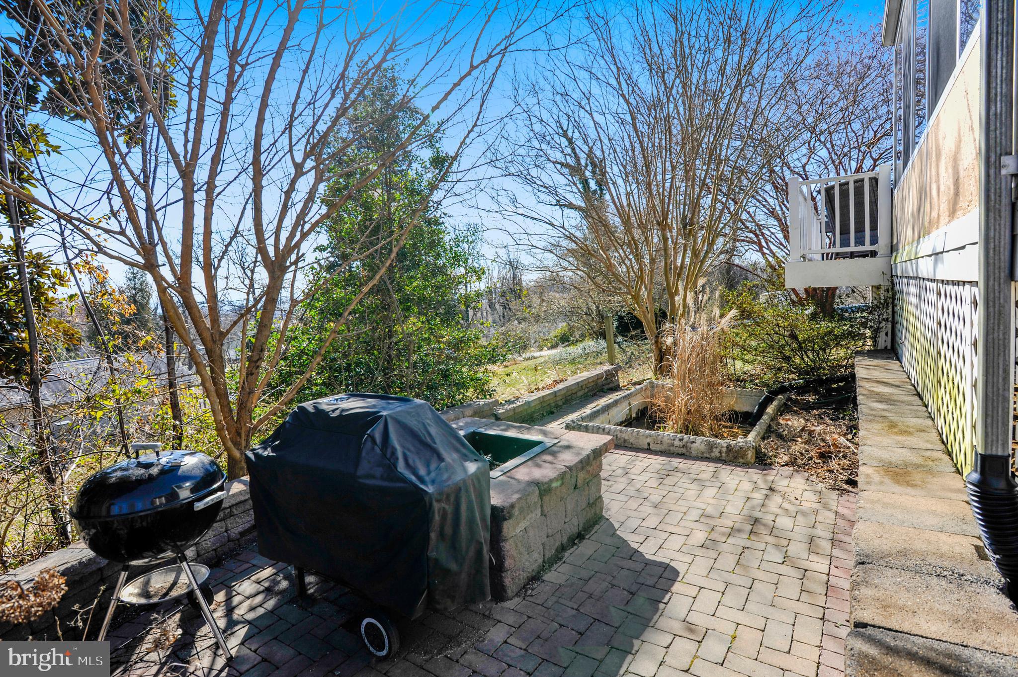 4888 Ridge Road Chesapeake Beach, MD 20732 - Photo 44 of 56 Patio with firepit and fish pond