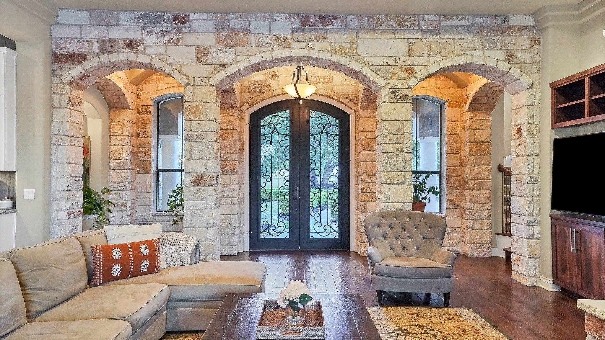 409 Escalera Parkway Georgetown, TX 78628 - Photo 13 of 40 a living room with furniture and a flat screen tv