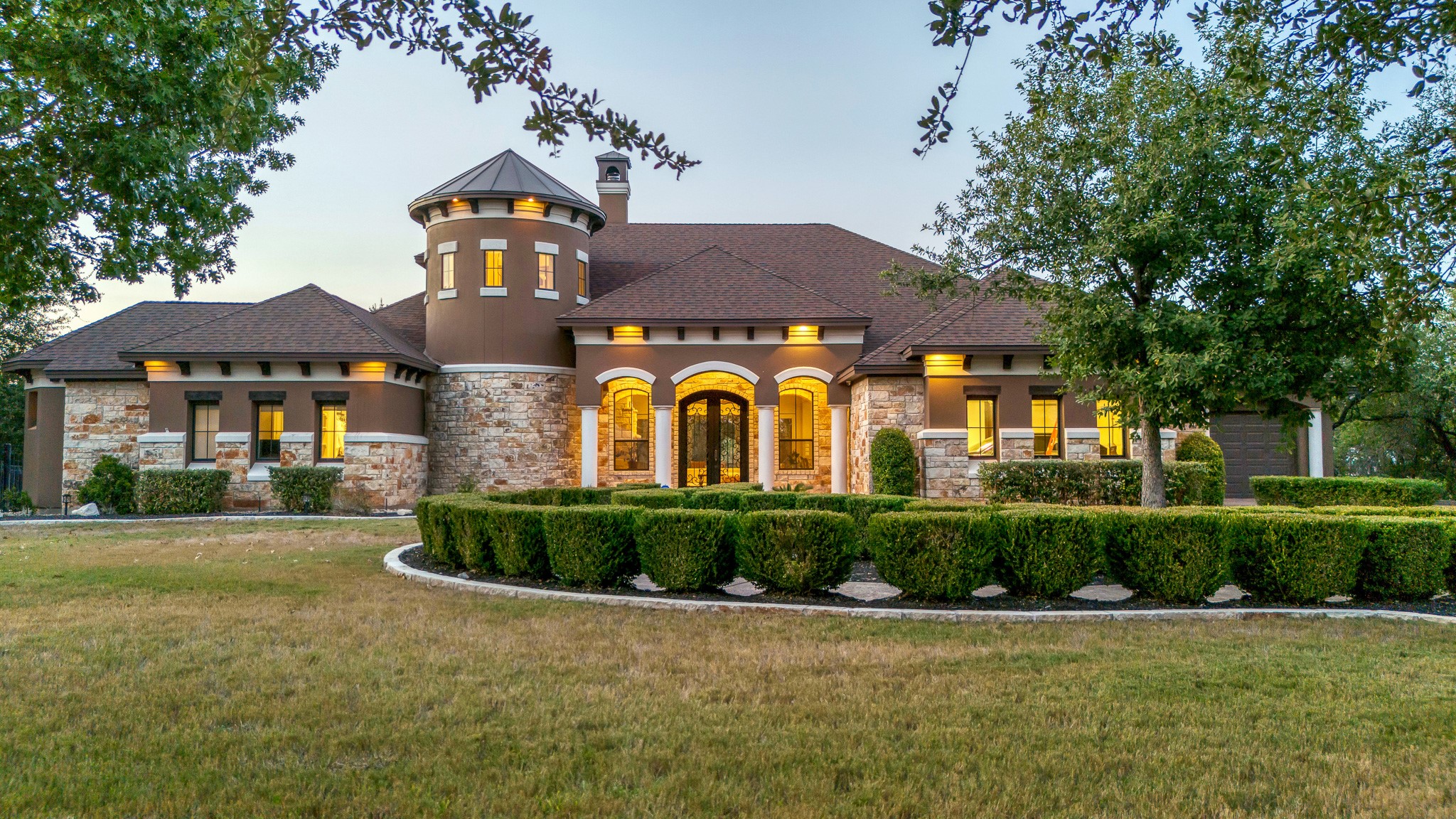 409 Escalera Parkway Georgetown, TX 78628 - Photo 2 of 40 a front view of a house with garden