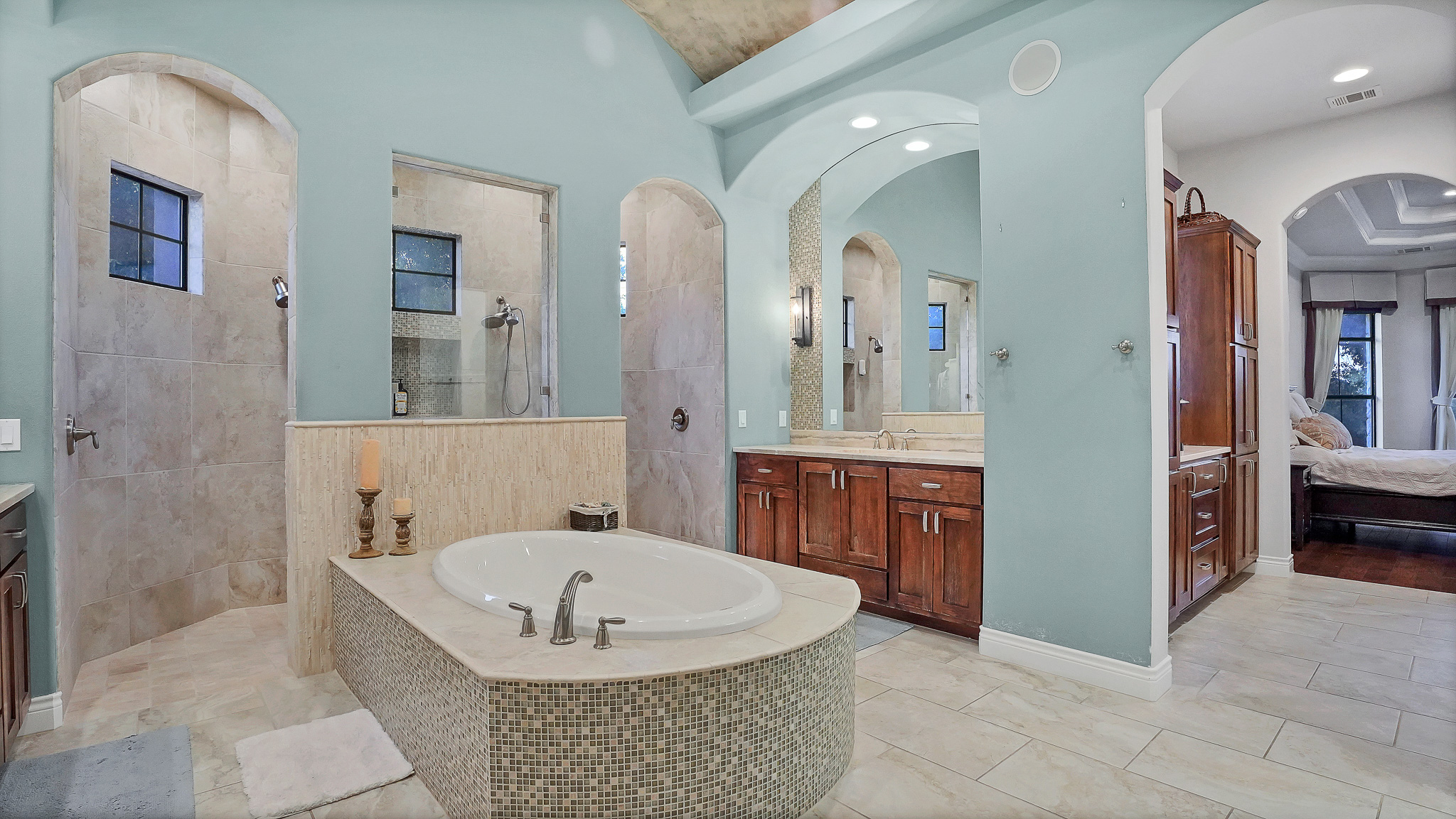 409 Escalera Parkway Georgetown, TX 78628 - Photo 24 of 40 a spacious bathroom with a tub sink and mirror