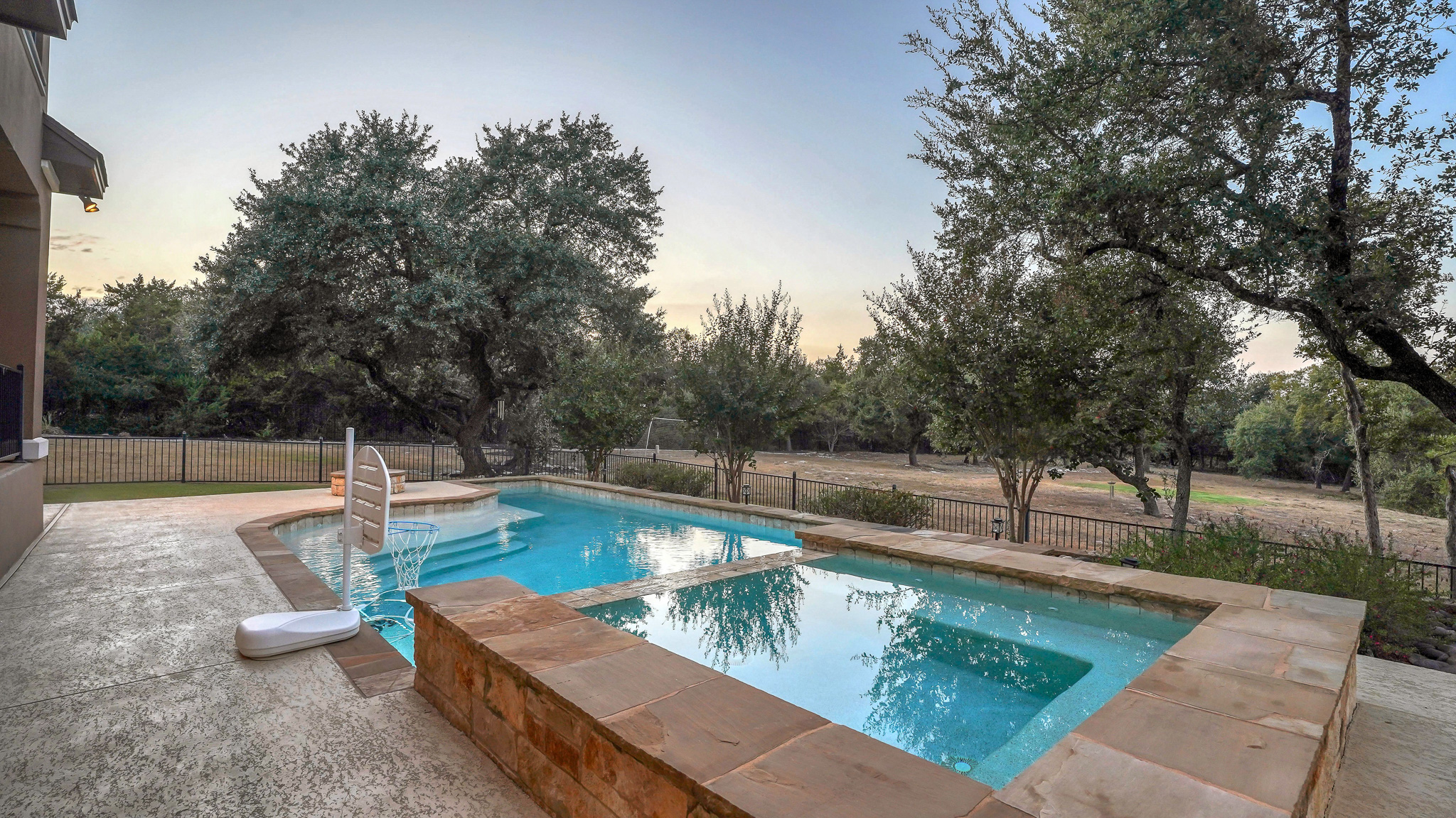 409 Escalera Parkway Georgetown, TX 78628 - Photo 39 of 40 a view of a swimming pool with a patio