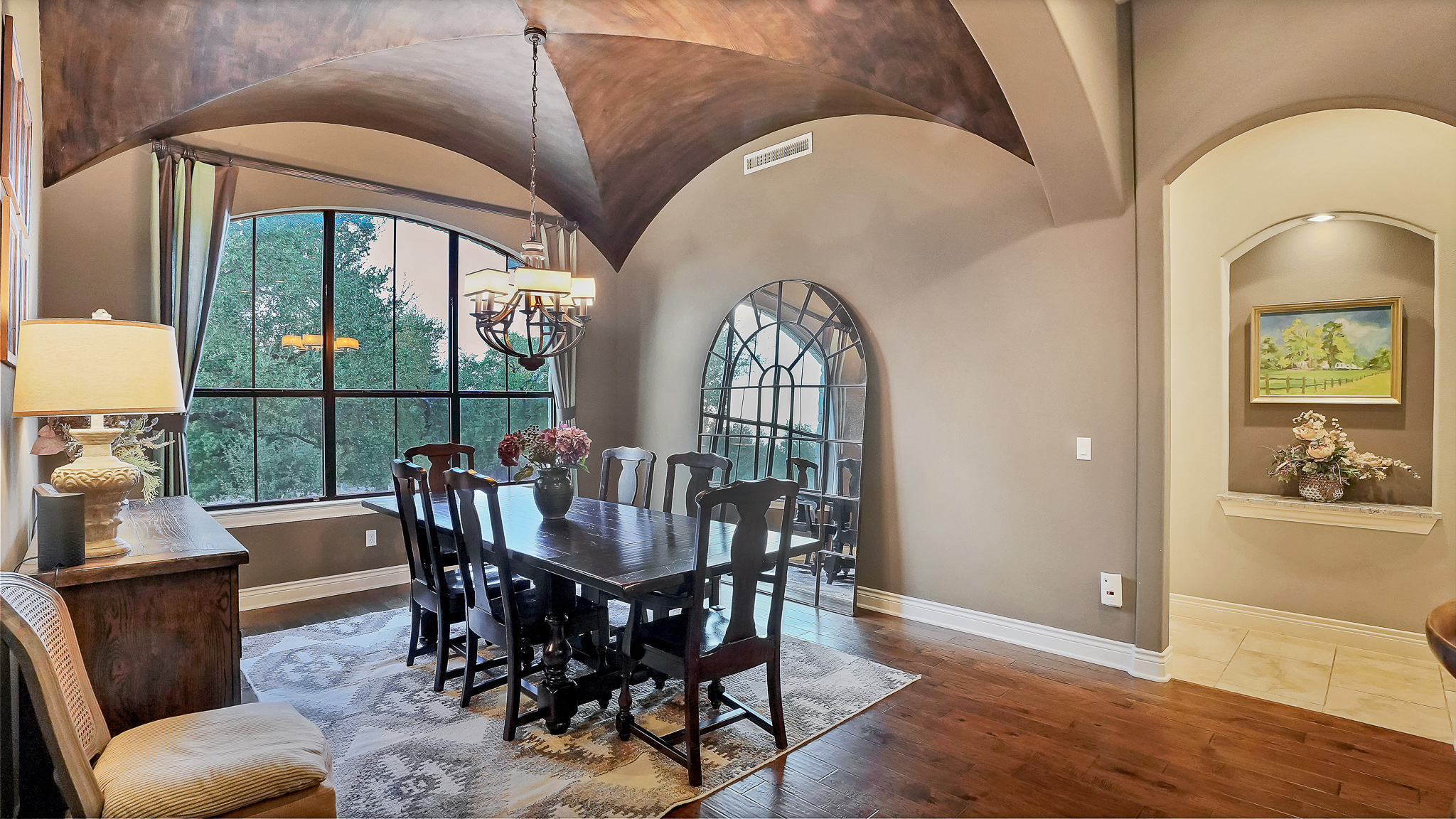 409 Escalera Parkway Georgetown, TX 78628 - Photo 7 of 40 a view of a dining room with furniture window and wooden floor