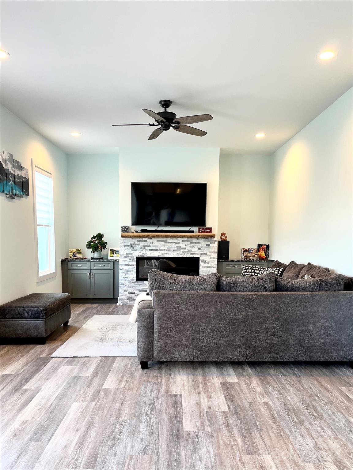 3117 Corinth Church Road Monroe, NC 28112 - Photo 11 of 30 a living room with furniture and a flat screen tv
