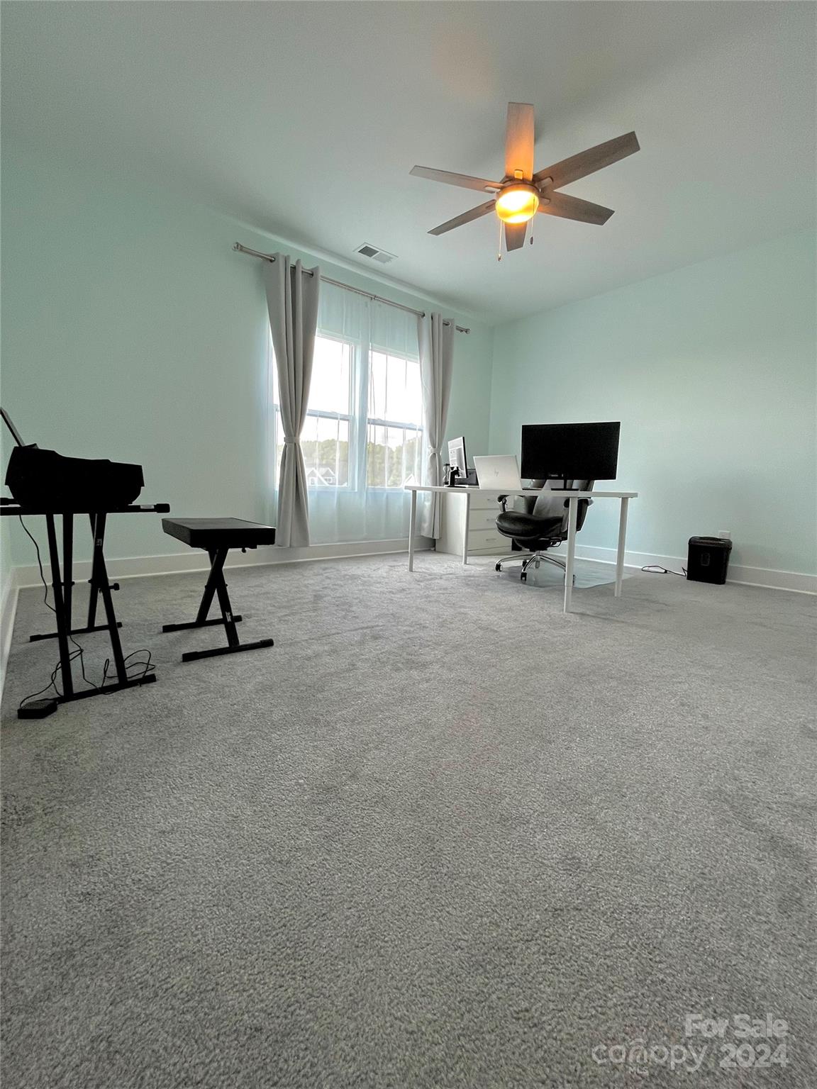 3117 Corinth Church Road Monroe, NC 28112 - Photo 23 of 30 a living room with furniture and a flat screen tv