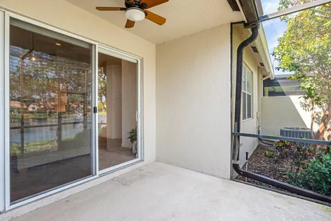 a view of a glass door with a balcony