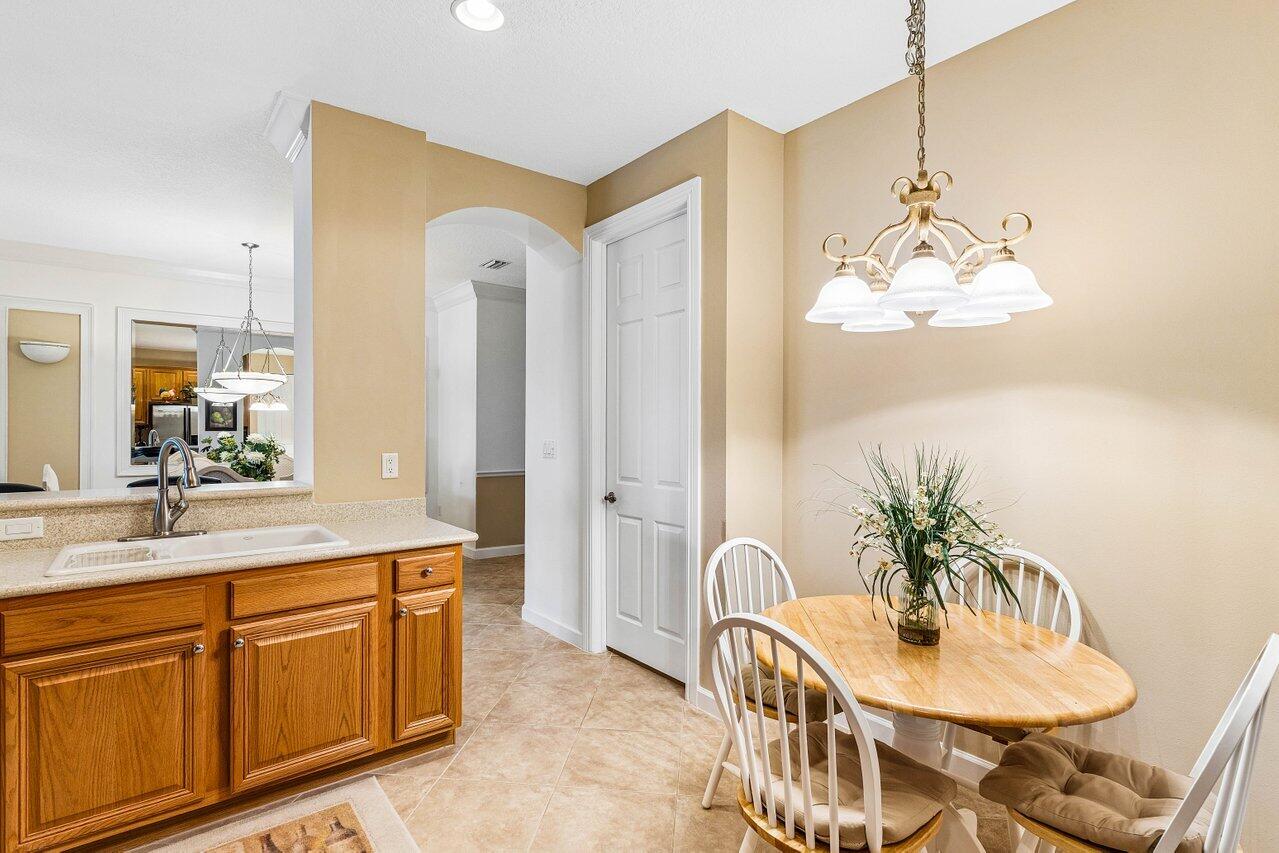 23069 Addison Lakes Circle Boca Raton, FL 33433 - Photo 5 of 26 a spacious bathroom with a granite countertop sink a mirror and a bathtub