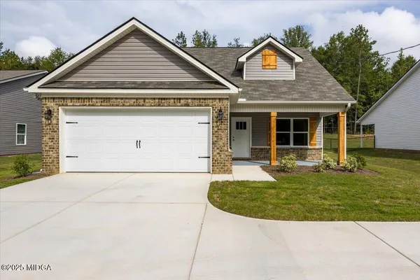a view of a house with entertaining space