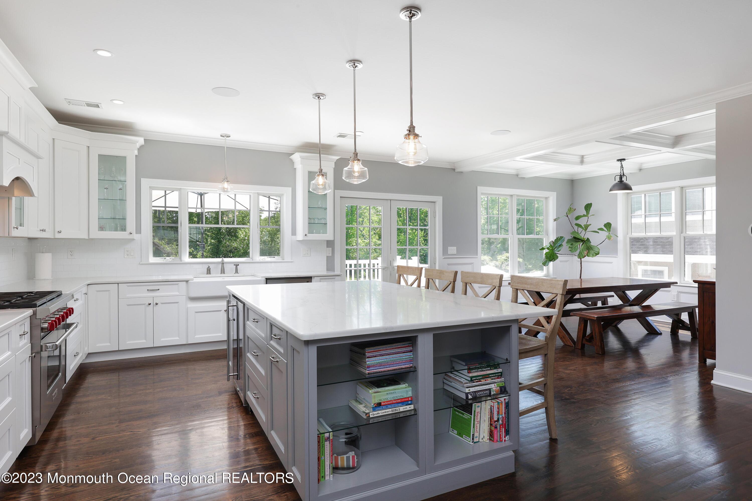 155 Osborn Avenue Bay Head, NJ 08742 - Photo 11 of 55 a kitchen with stainless steel appliances granite countertop a stove and kitchen island
