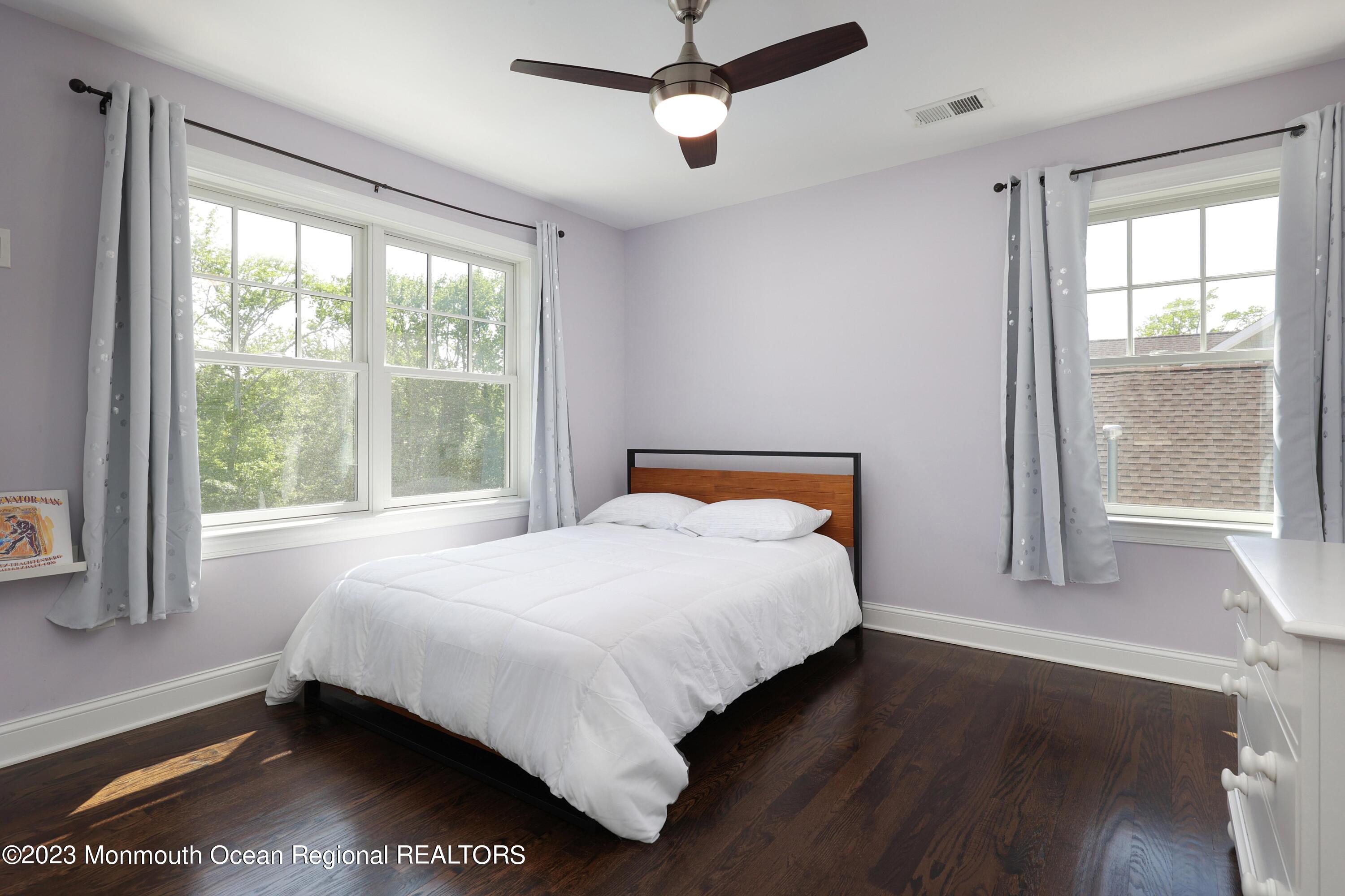 155 Osborn Avenue Bay Head, NJ 08742 - Photo 18 of 55 a bedroom with a large bed and a window