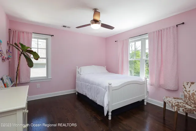 a bed room with a bed and a window