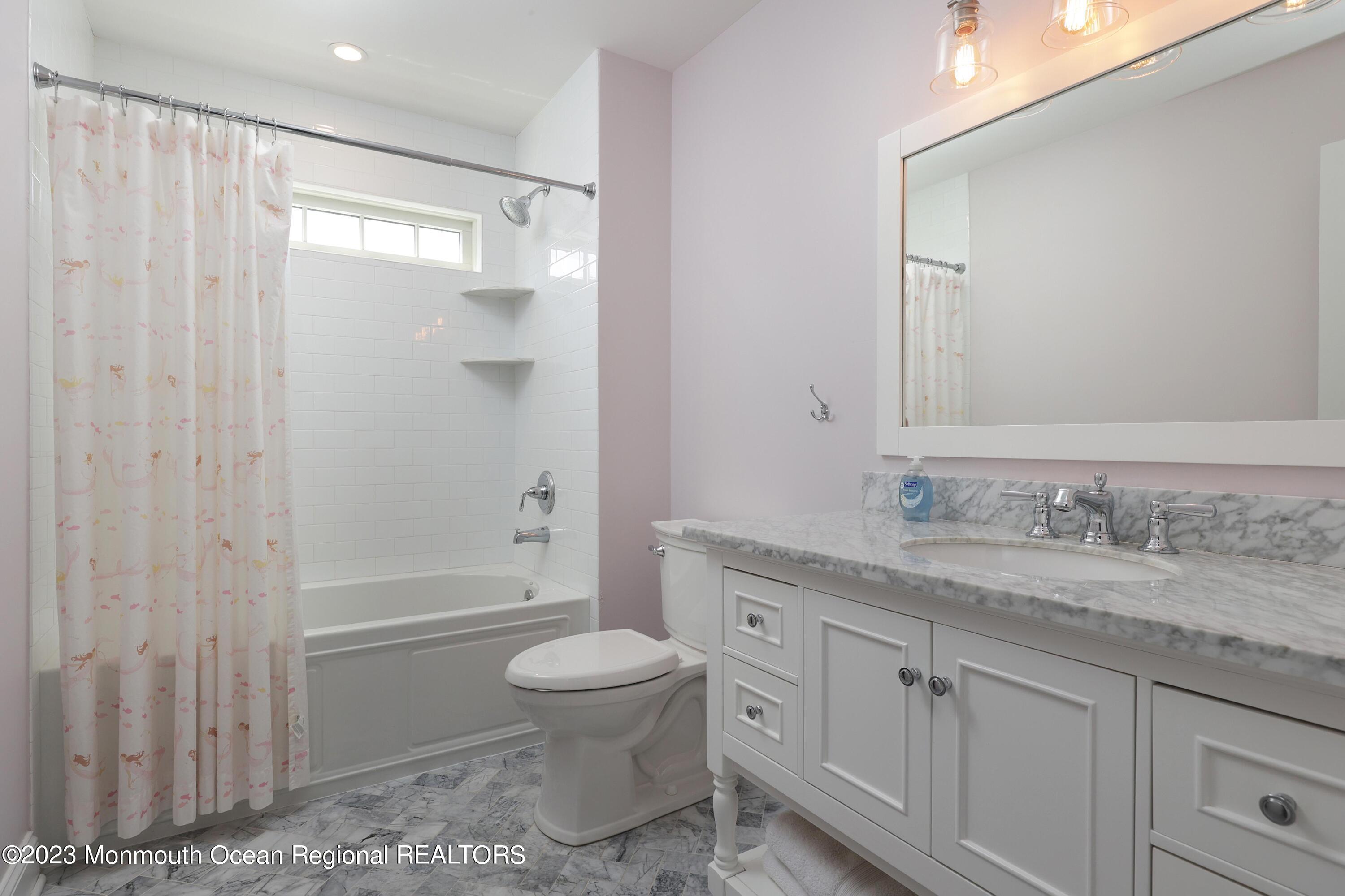155 Osborn Avenue Bay Head, NJ 08742 - Photo 20 of 55 a bathroom with a granite countertop sink toilet and shower