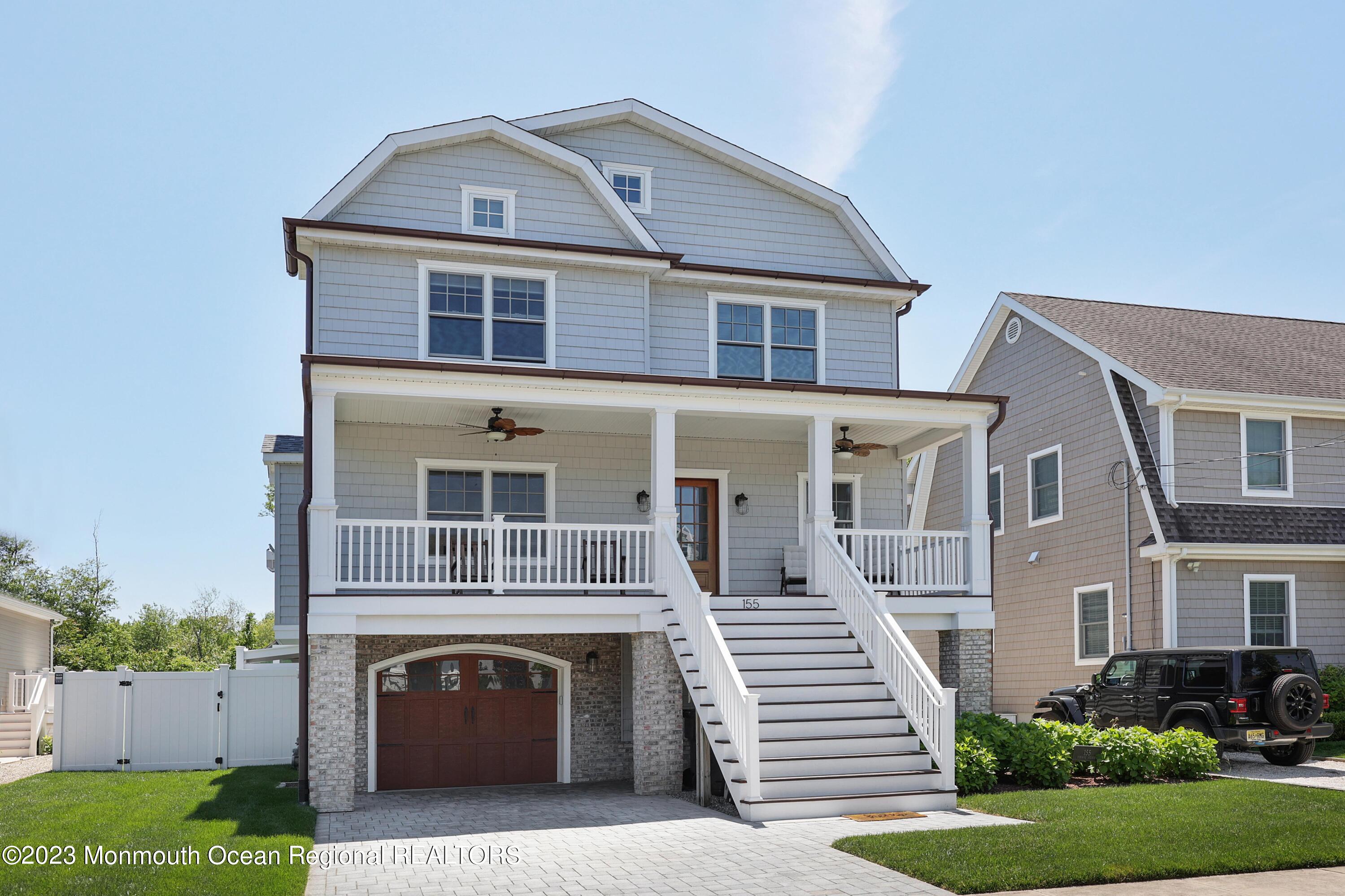 155 Osborn Avenue Bay Head, NJ 08742 - Photo 2 of 55 a front view of a house with a yard