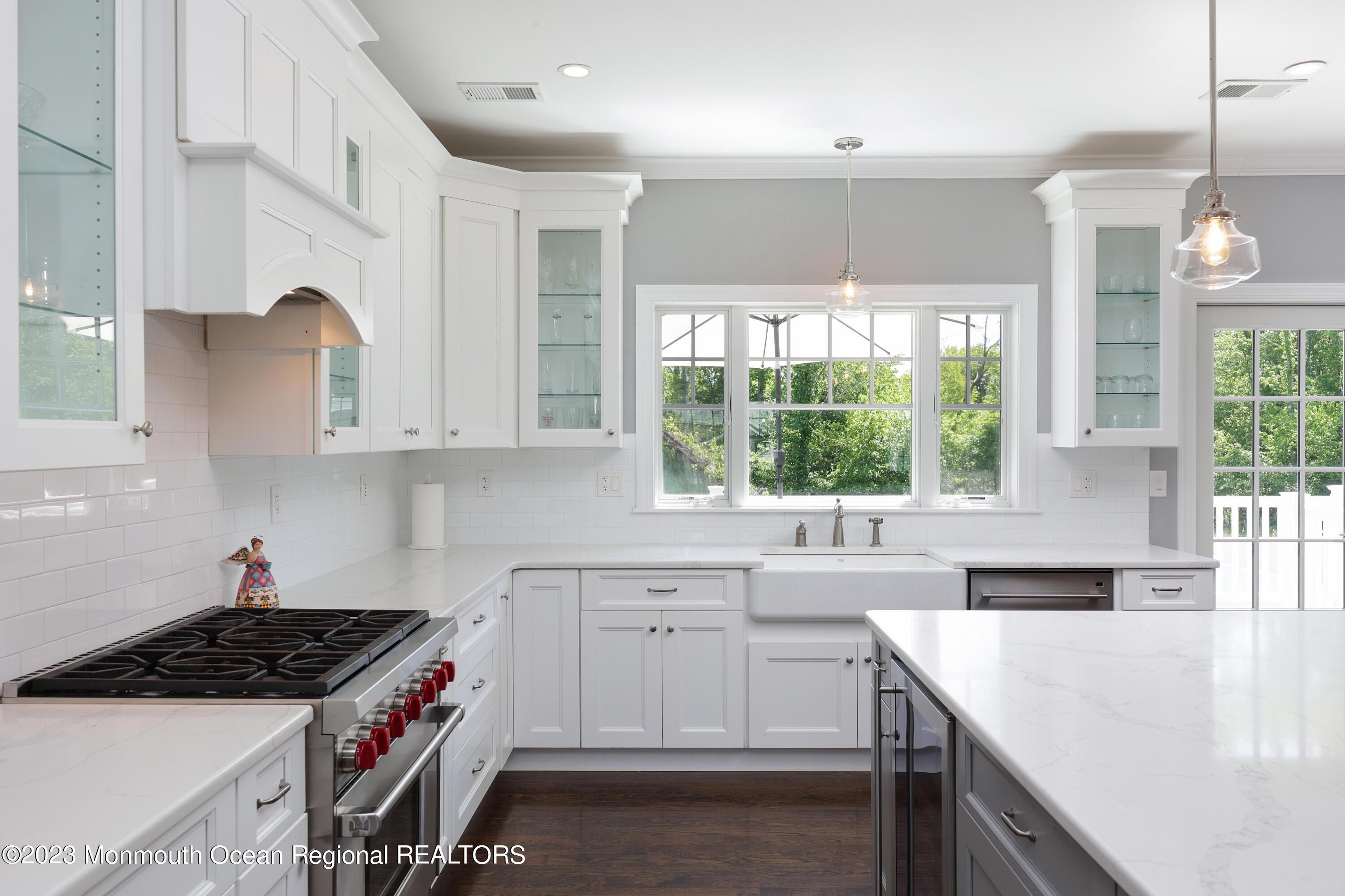 155 Osborn Avenue Bay Head, NJ 08742 - Photo 8 of 55 a kitchen with a sink a stove and cabinets