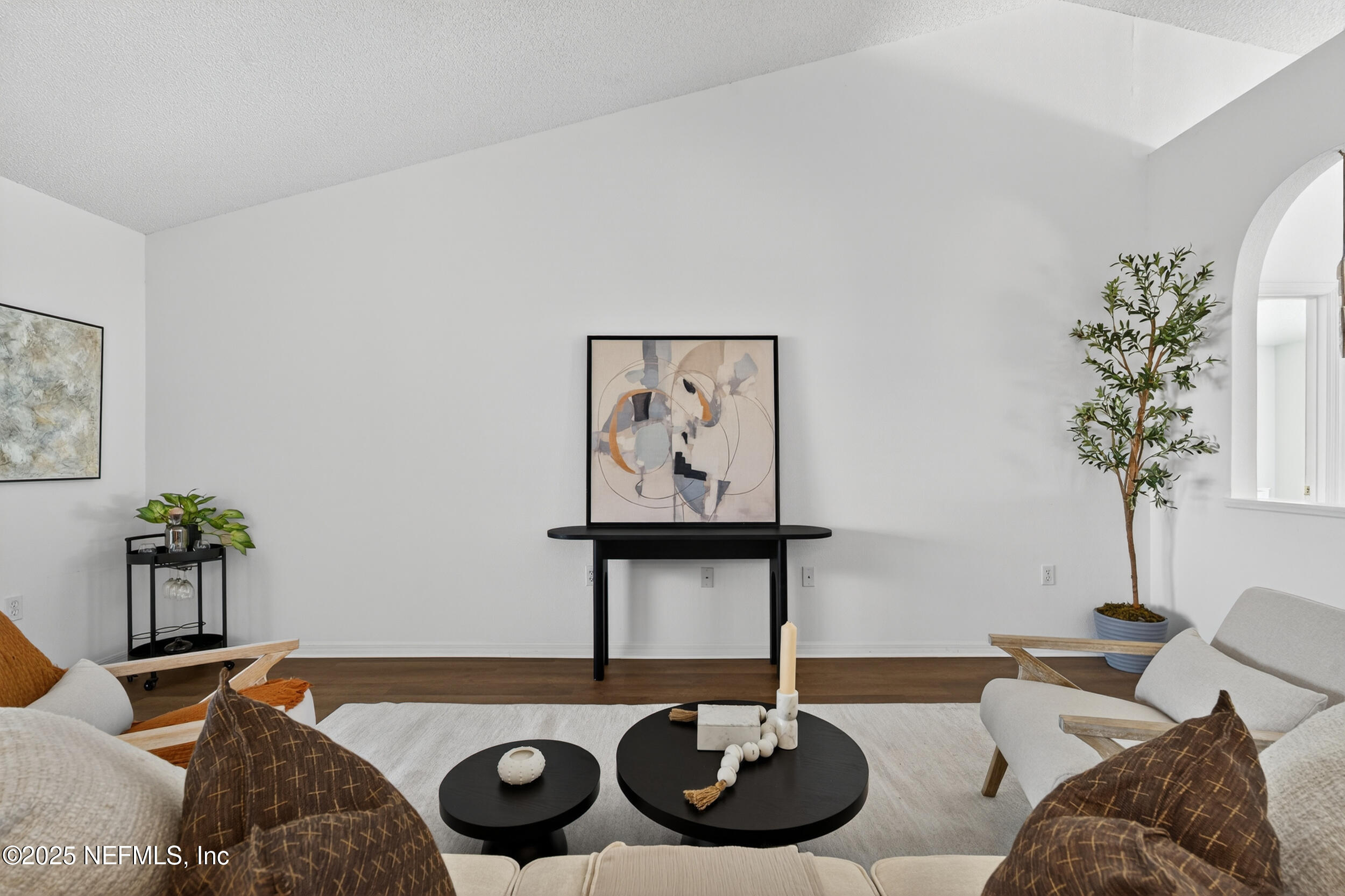 12405 Hickory Forest Road Jacksonville, FL 32226 - Photo 11 of 48 a living room with furniture and flowers