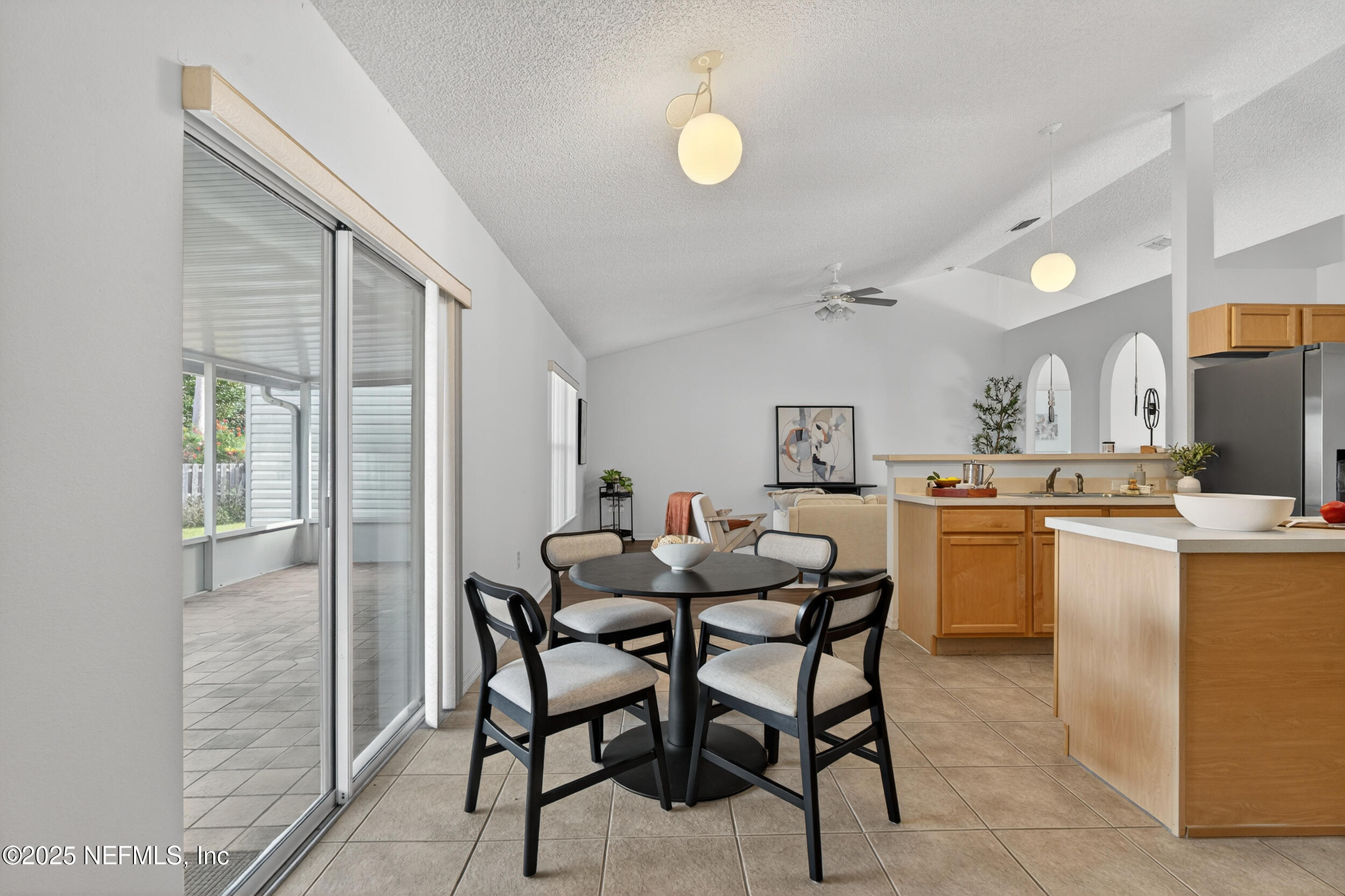 12405 Hickory Forest Road Jacksonville, FL 32226 - Photo 19 of 48 a dining room with furniture and window