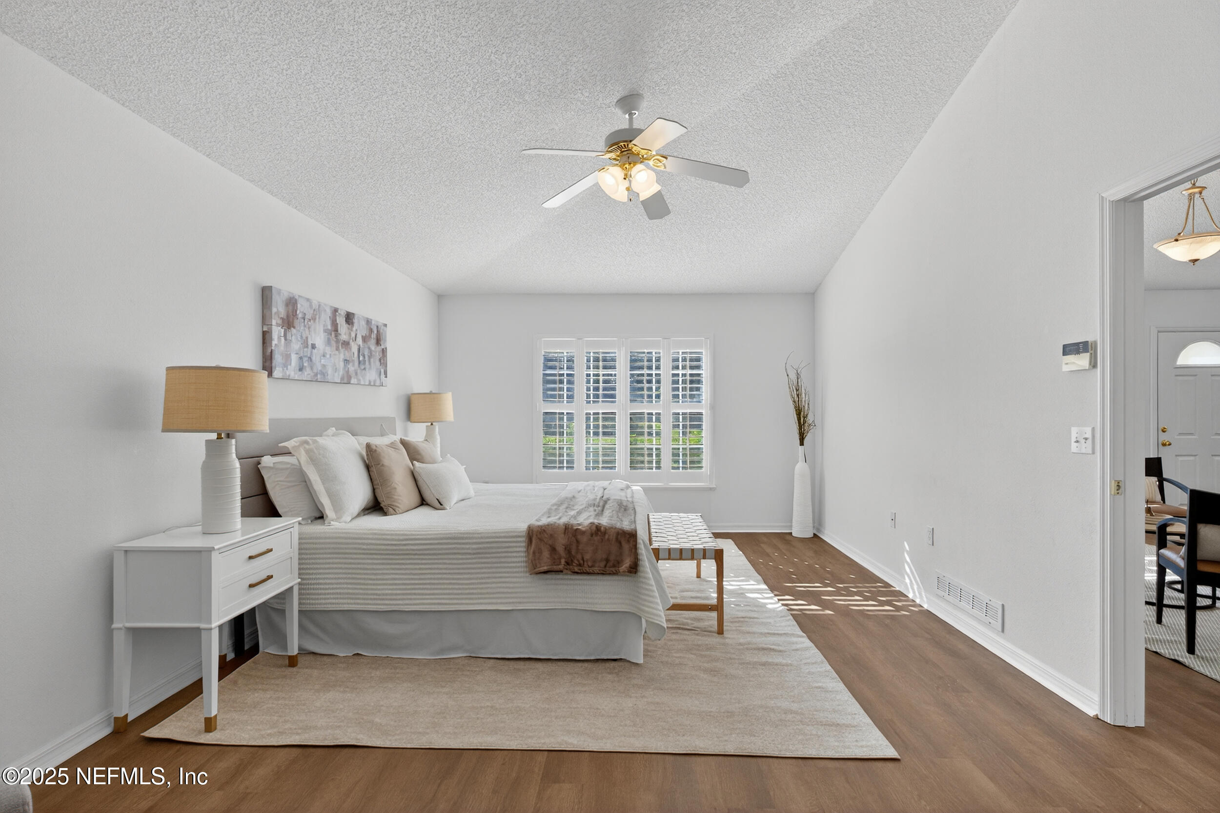 12405 Hickory Forest Road Jacksonville, FL 32226 - Photo 25 of 48 a living room with a bed furniture and a window