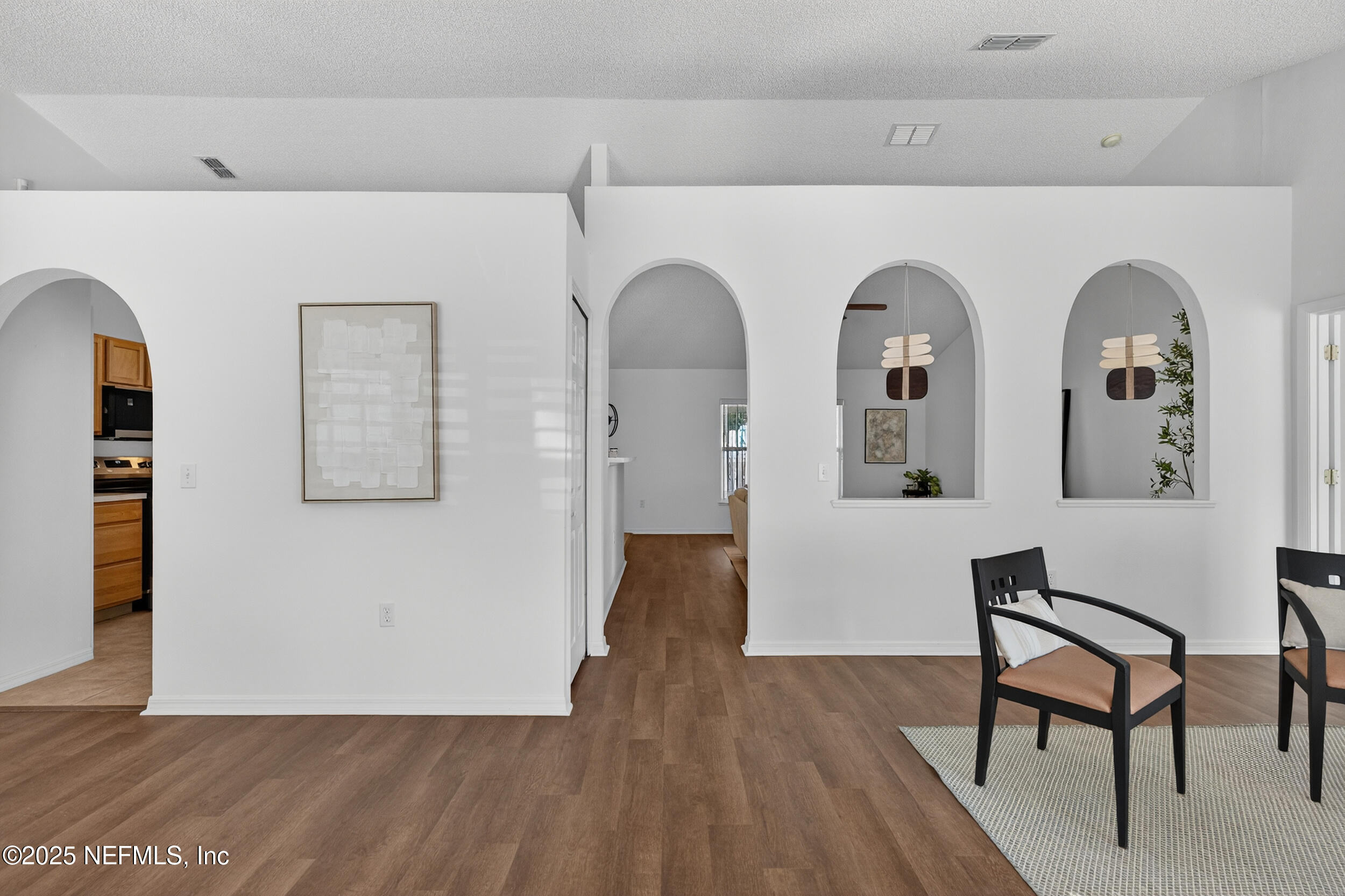 12405 Hickory Forest Road Jacksonville, FL 32226 - Photo 3 of 48 a view of entryway with wooden floor