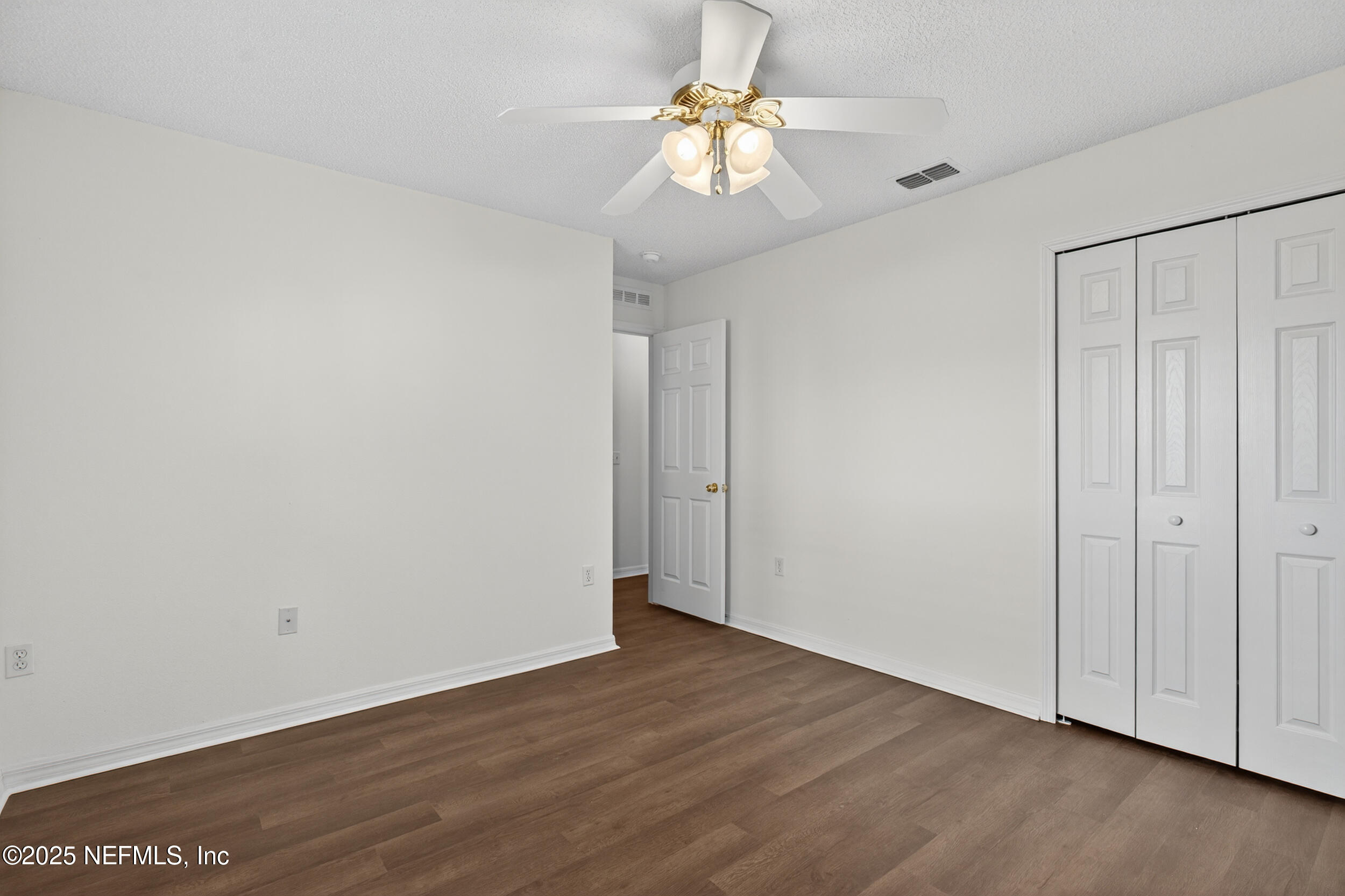 12405 Hickory Forest Road Jacksonville, FL 32226 - Photo 31 of 48 a view of an empty room with a window