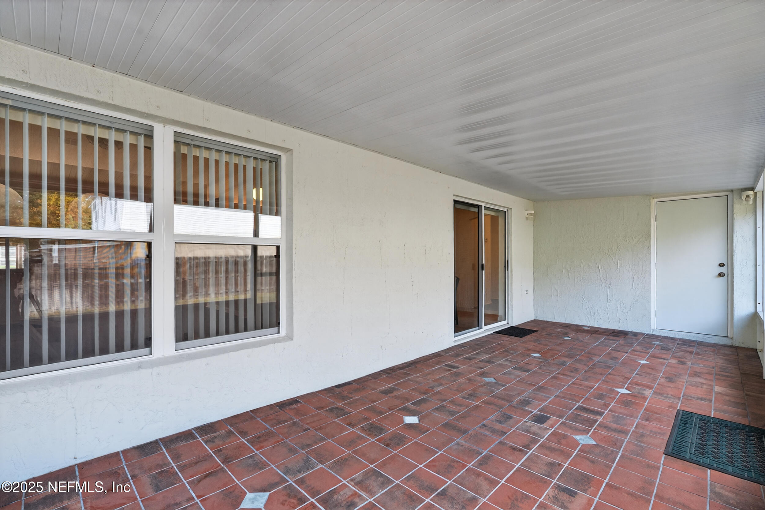 12405 Hickory Forest Road Jacksonville, FL 32226 - Photo 39 of 48 a view of an empty room with a window