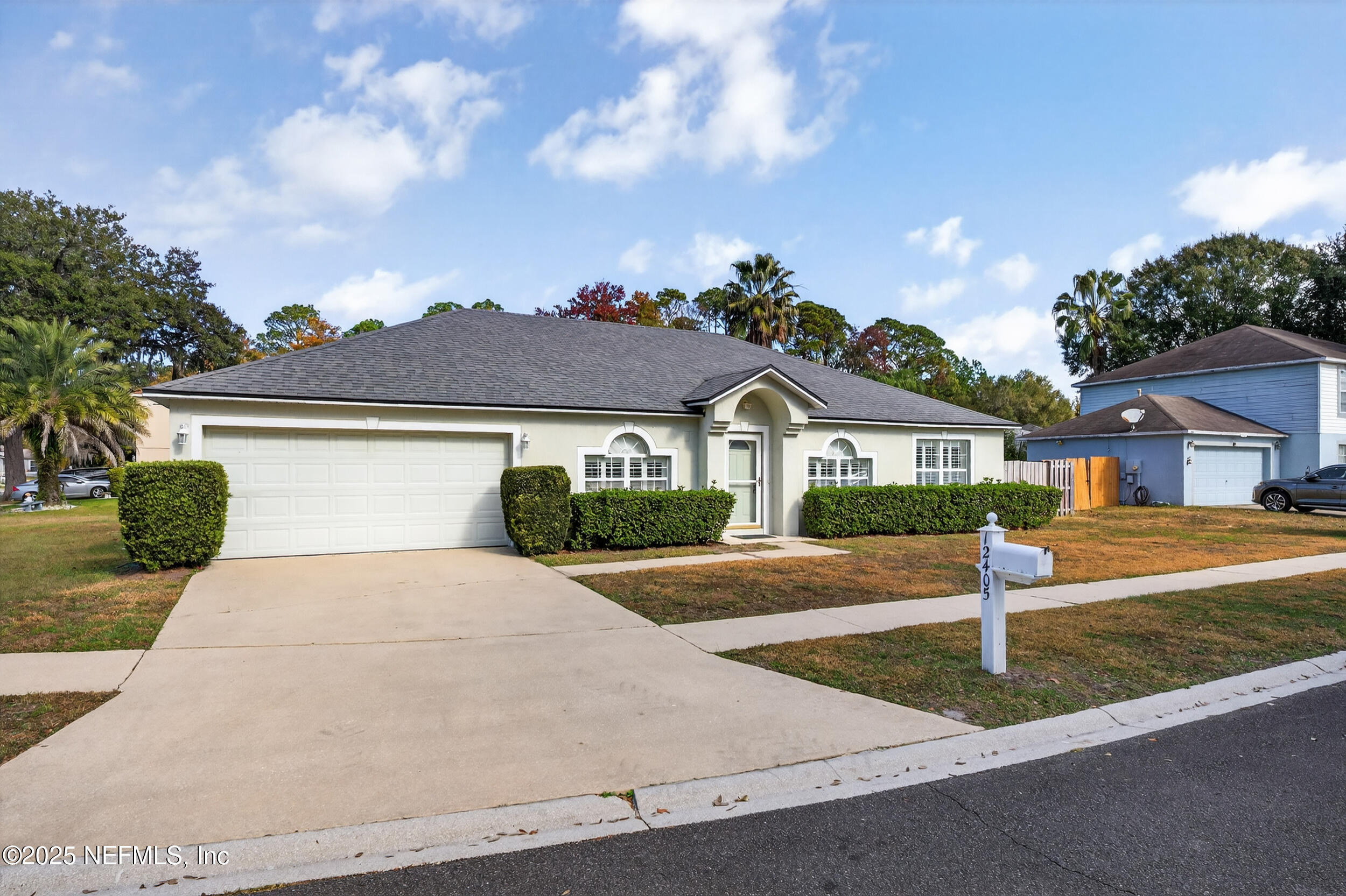 12405 Hickory Forest Road Jacksonville, FL 32226 - Photo 47 of 48 a front view of a house with a yard