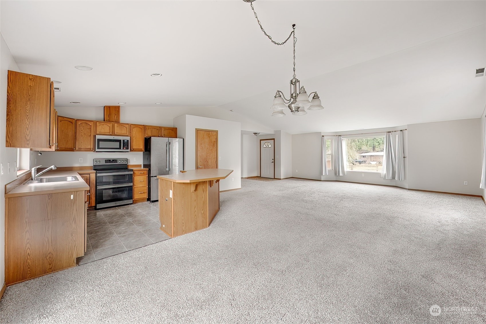 137 Ridgecrest Drive Longview, WA 98632 - Photo 10 of 40 a view of a kitchen with furniture and windows