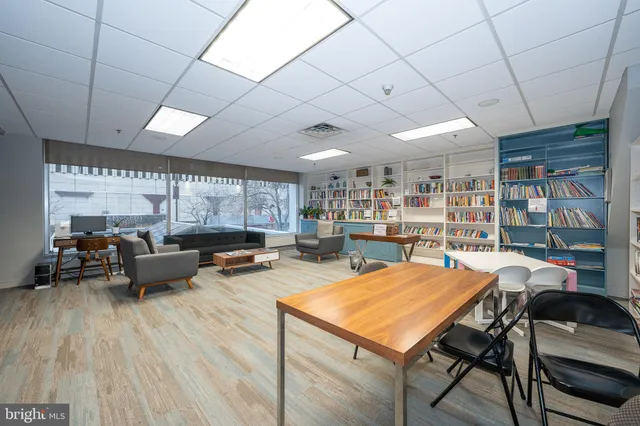 a view of living room filled with furniture
