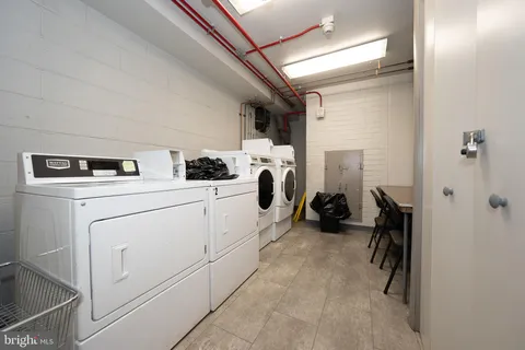 a room with furniture and a chandelier