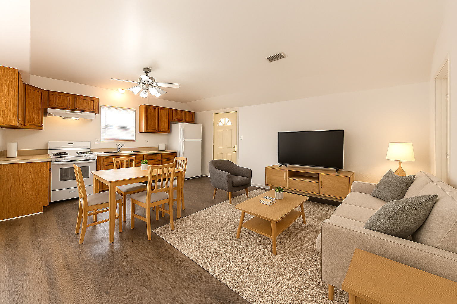 425 East 9th Street, Unit 2 Lockport, IL 60441 - Photo 2 of 7 a living room with furniture kitchen view and a flat screen tv