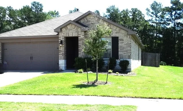 a view of outdoor space with deck and yard