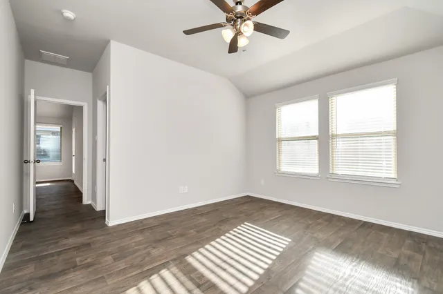 a view of a big room with wooden floor