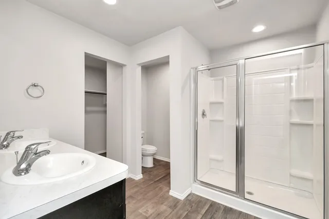 a kitchen with a sink and a mirror