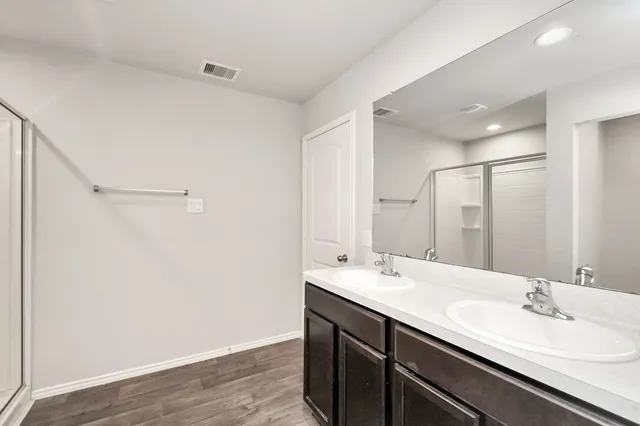 a view of an empty walk in closet