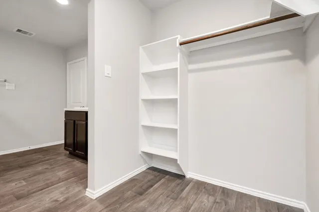 a view of storage and utility room with washer and dryer