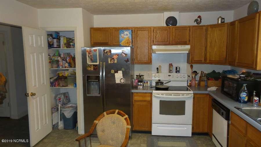 851 Roberts Road Newport, NC 28570 - Photo 8 of 15 851 Roberts Road Kitchen with pantry_res