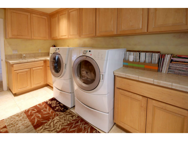 293 Arrowhead Way Scotts Valley, CA 95066 - Photo 17 of 25 a utility room with dryer and washer