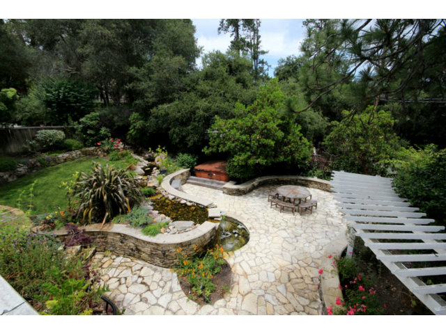 293 Arrowhead Way Scotts Valley, CA 95066 - Photo 2 of 25 a view of a backyard with plants and patio