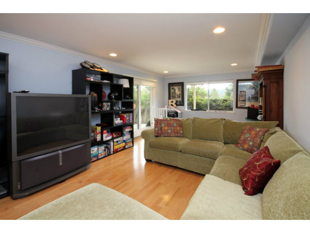 293 Arrowhead Way Scotts Valley, CA 95066 - Photo 8 of 25 a living room with furniture and a flat screen tv