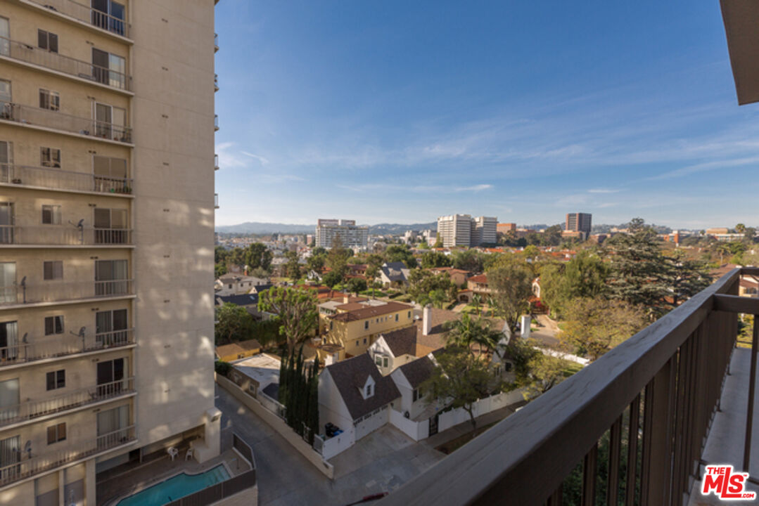 10747 Wilshire Boulevard, Unit 905 Los Angeles, CA 90024 - Photo 5 of 7 a view of a city from a balcony