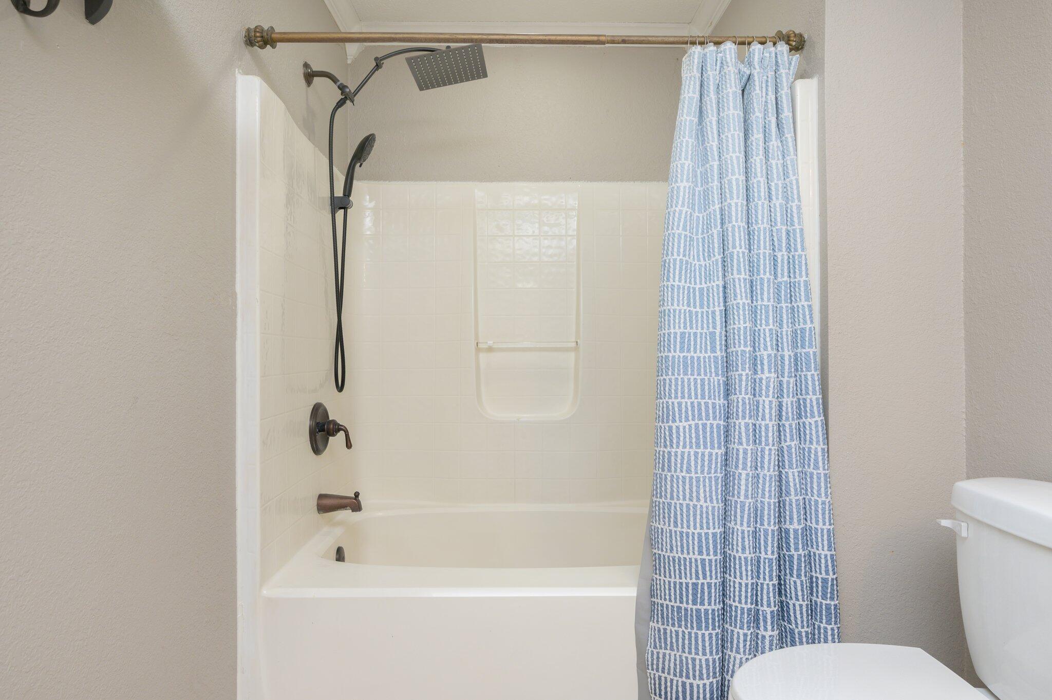111 Sikes Drive Crestview, FL 32539 - Photo 12 of 46 a bathroom with a shower and a toilet