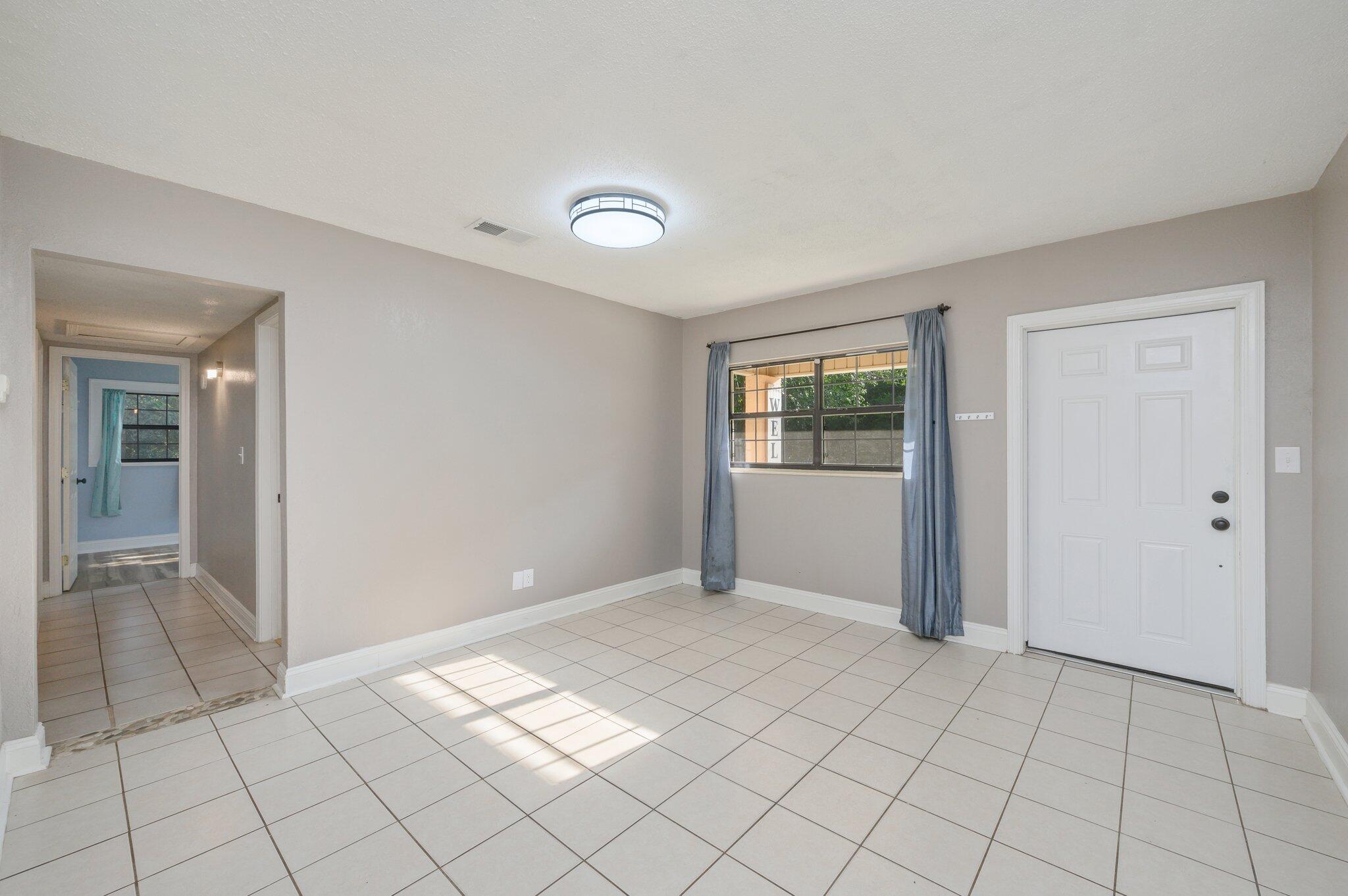 111 Sikes Drive Crestview, FL 32539 - Photo 15 of 46 a view of an empty room and window