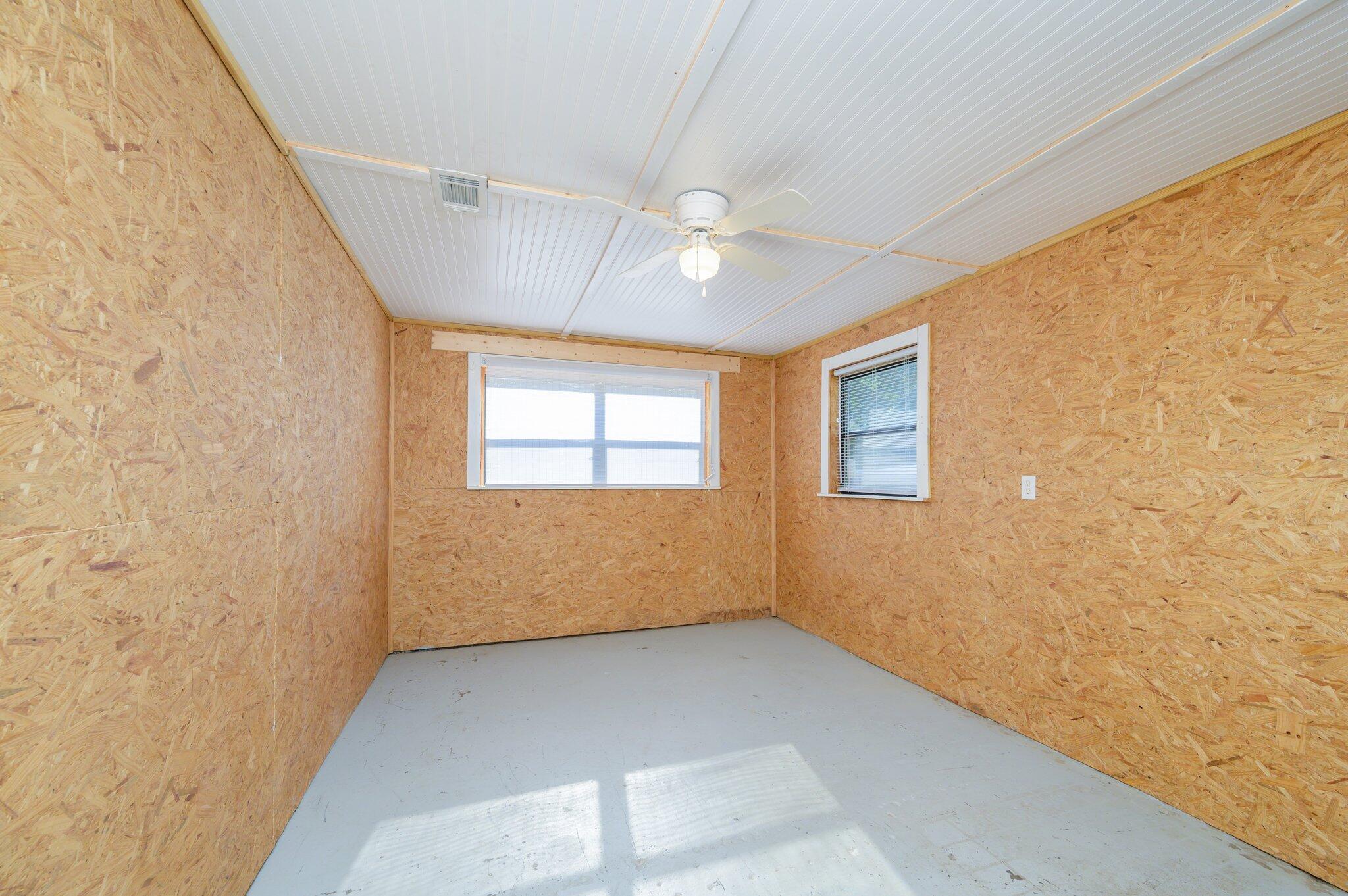 111 Sikes Drive Crestview, FL 32539 - Photo 31 of 46 a view of an empty room with a window
