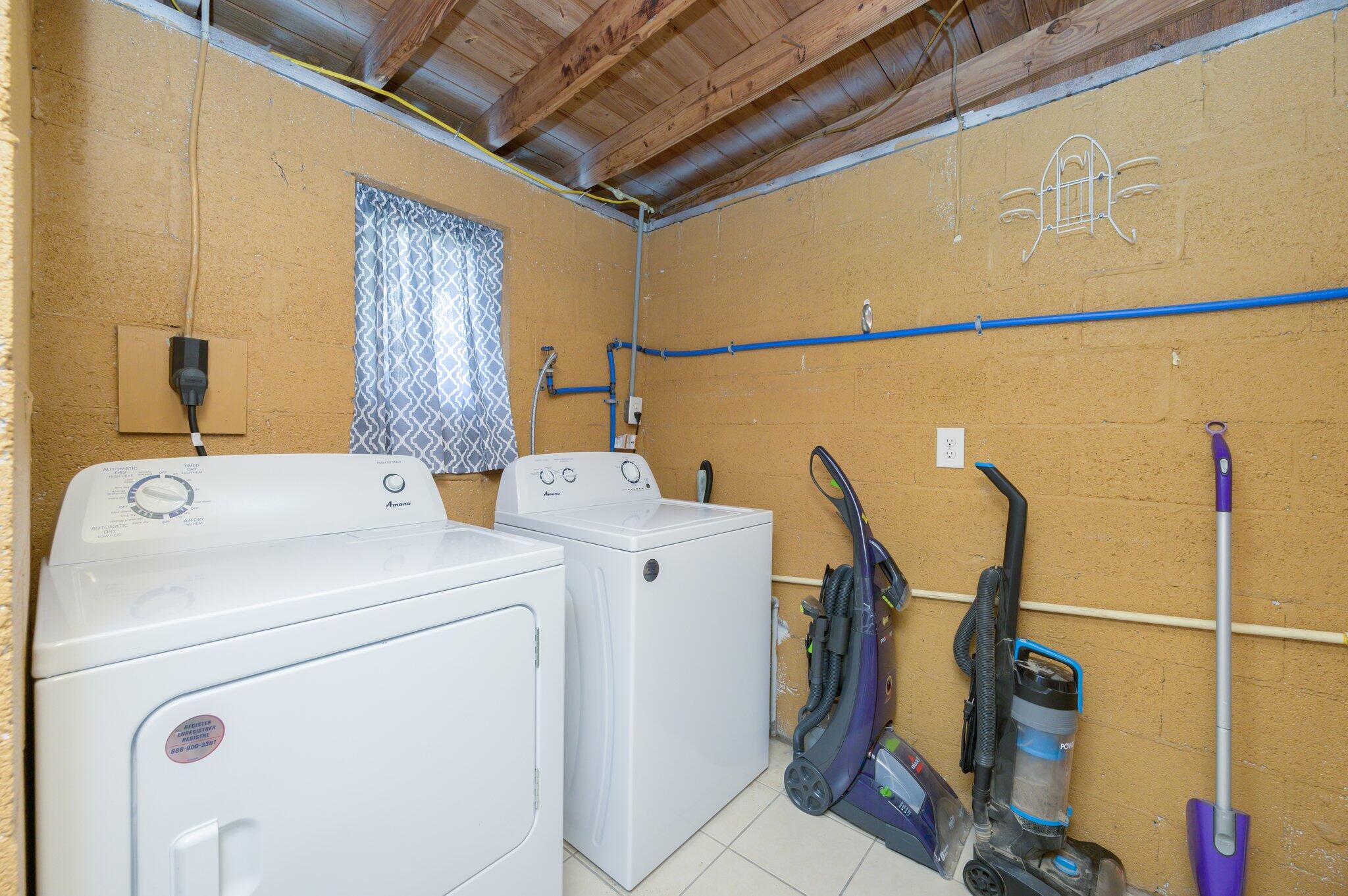 111 Sikes Drive Crestview, FL 32539 - Photo 33 of 46 a utility room with dryer and washer