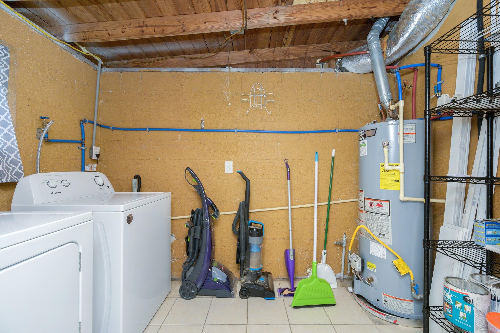 111 Sikes Drive Crestview, FL 32539 - Photo 34 of 46 a utility room with dryer and washer