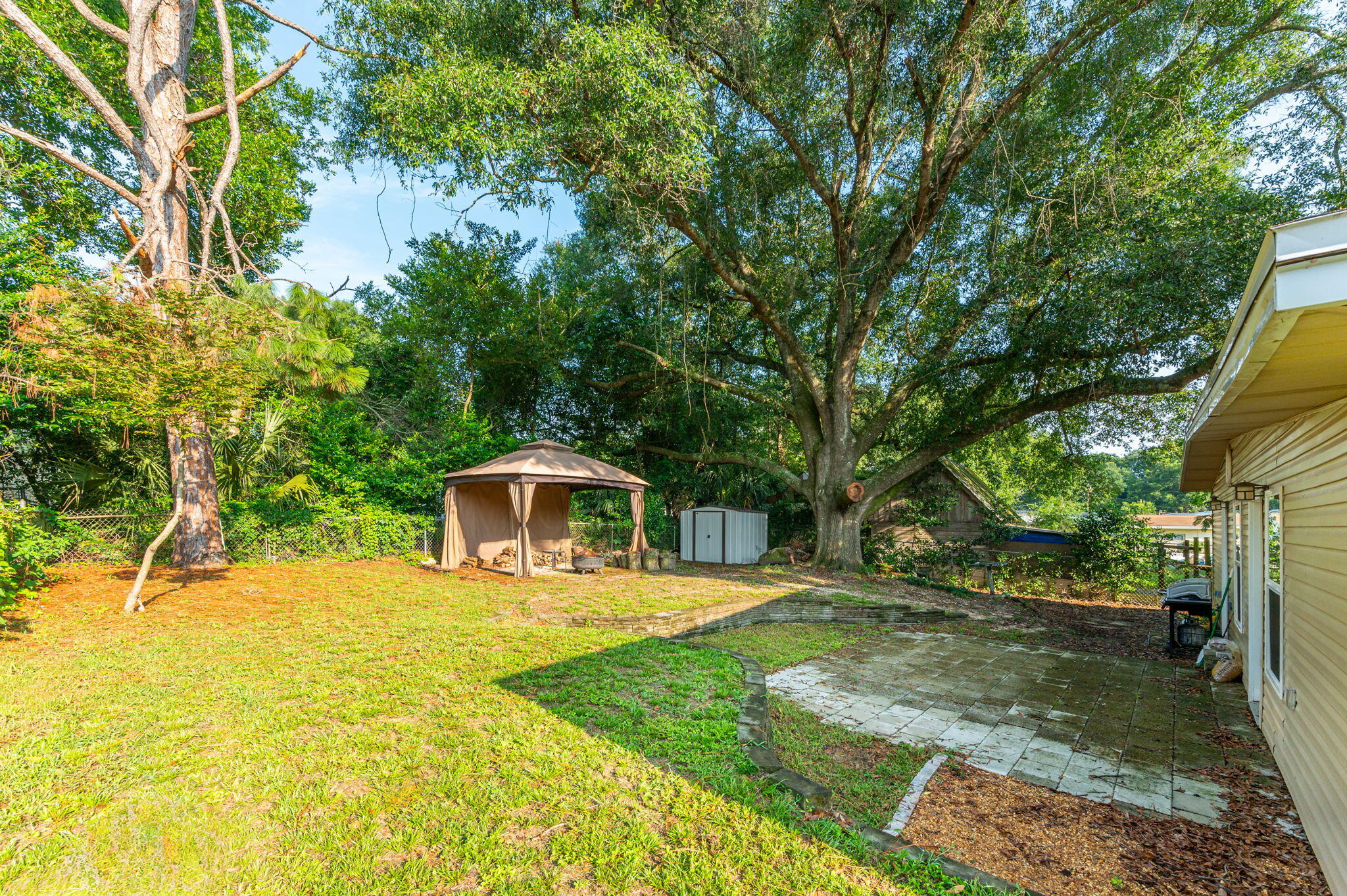 111 Sikes Drive Crestview, FL 32539 - Photo 35 of 46 a front view of a house with a yard