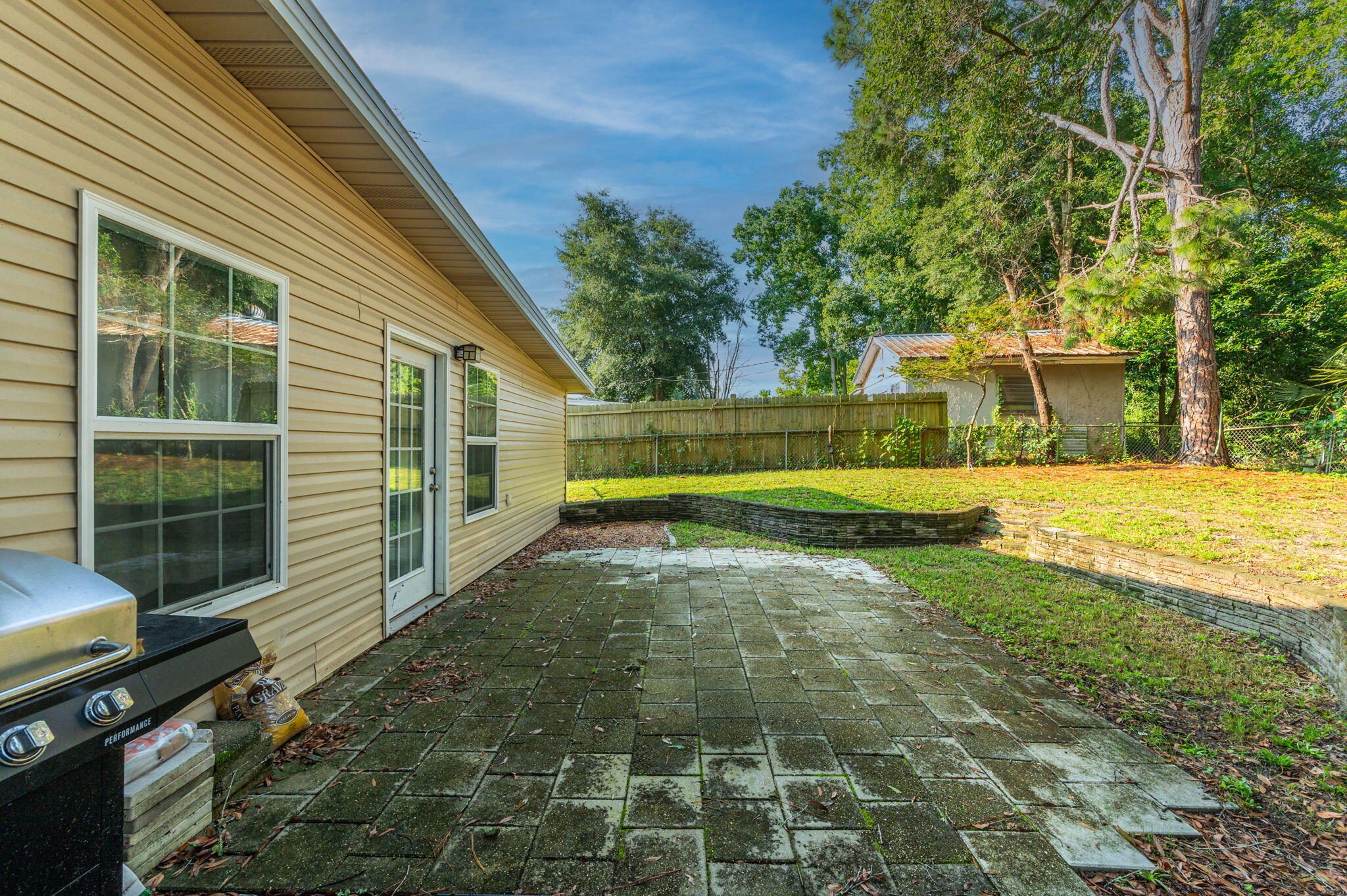 111 Sikes Drive Crestview, FL 32539 - Photo 44 of 46 a view of a house with a yard