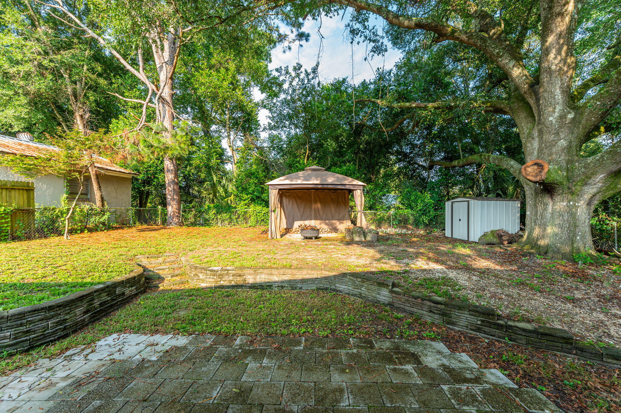 111 Sikes Drive Crestview, FL 32539 - Photo 45 of 46 a view of a house with backyard and tree