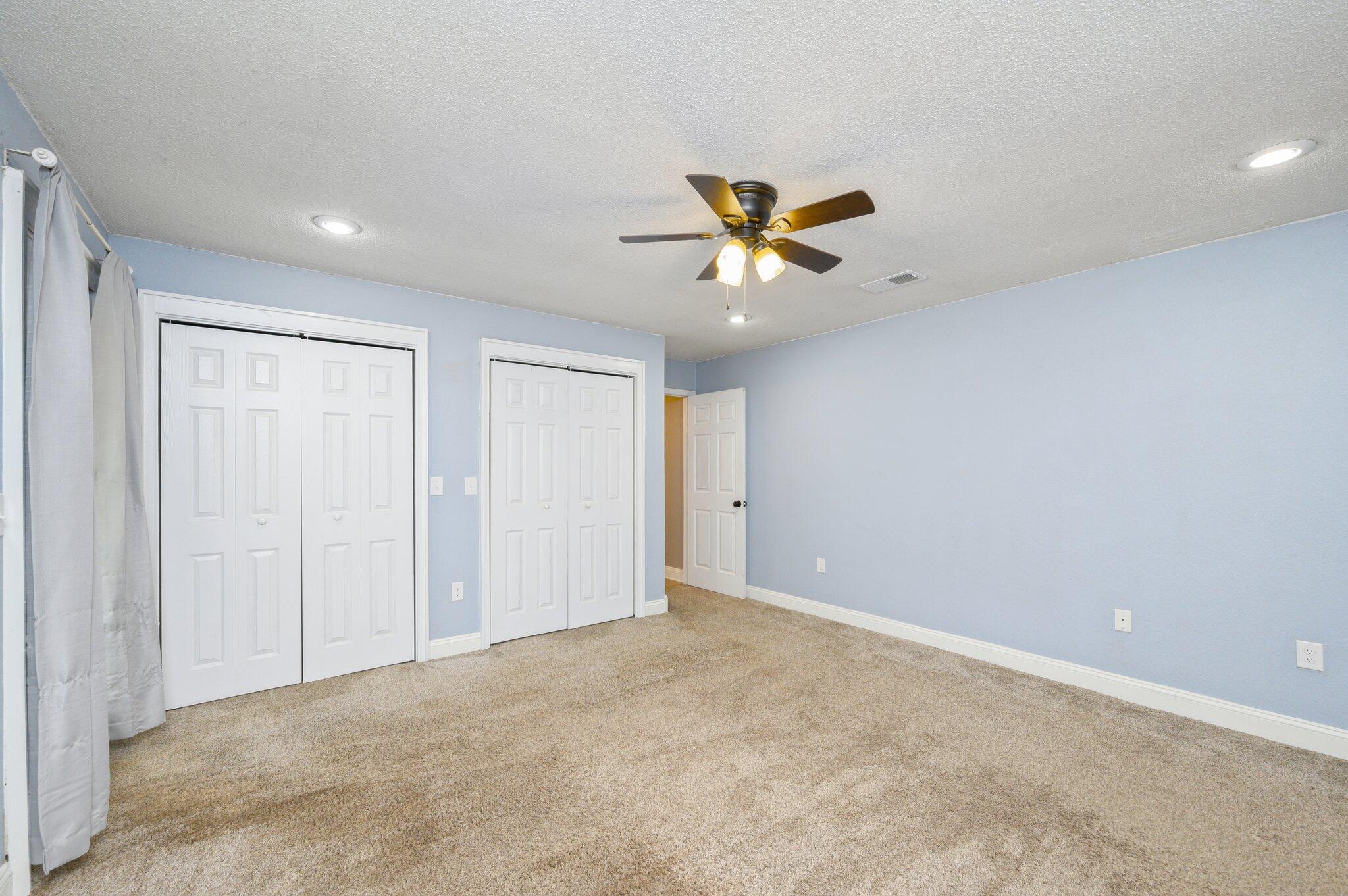 111 Sikes Drive Crestview, FL 32539 - Photo 10 of 46 a view of an empty room with a window