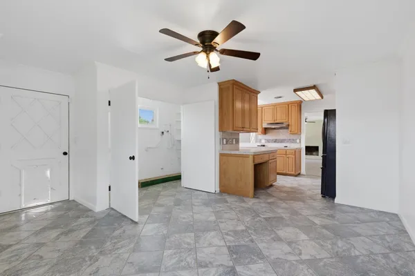 a view of cabinets and window