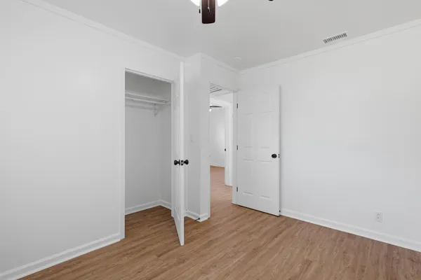 a view of a livingroom with wooden floor